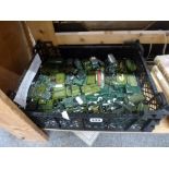 A crate of military die cast model vehicles including Matchbox, Dinky, Corgi, Husky, Crescent and
