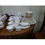 A Minton Spring Bouquet part tea and dinner service approximately 54 pieces. [back of room] WE DO