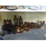 A metalware lot including five copper jugs, seven copper tankards, copper kettle, copper jardineres,