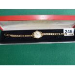 A lady's 9 ct gold wrist watch and bracelet by Doxa, 14 gm excluding movement and including glass WE