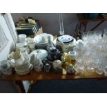 A large quantity of glassware including whisky tumblers, wine glasses, bowls, knife rests,