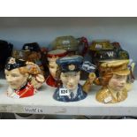 Eight various character jugs, mainly military, including Royal Auxiliary Airforce D7212, Auxiliary