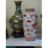 A modern Chinese cloisonne enamel vase in two pieces, on wood stand; and a porcelain vase painted