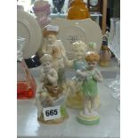 Four figurines of children comprising Royal Worcester Days of the Week Wednesday's Boy, Royal