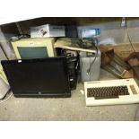 A selection of monitors, keyboards, a battery charger and a data set unit etc. [Under G16] WE DO NOT