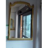 A rectangular gold painted mirror with side column decoration. WE DO NOT ACCEPT CREDIT CARDS.