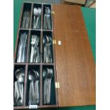An extensive Old Hall stainless steel cutlery service in possibly original compartmented teak