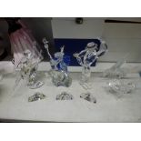 Three Swarovski Collectors' Society silver crystal figures, of Isadora 2002, Antonio 2003, and
