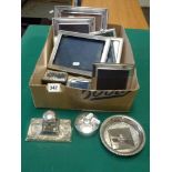 A good collection of eight modern silver-overlaid photograph frames, 7 to 21.5 cm overall; a