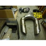 An unused high performance motorbike's twin exhaust in stainless steel, possibly for a KTM LC8 V-
