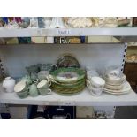 A green Poole Pottery part-tea service plus another by Adderley decorated with ferns, plus a turn-
