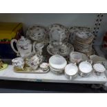 A large collection of Royal Worcester crockery decorated with a Chinese-style pattern of baskets and