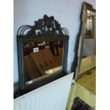 A small metal framed mirror with floral surmount. WE DO NOT ACCEPT CREDIT CARDS. CLEARANCE