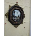 A small octagonal wall mirror in 16th century style, circa 1900, with hardstone panels to the ornate