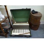 A super Mazzini cased hand-held accordion. [floor next to s83] WE DO NOT ACCEPT CREDIT CARDS.