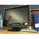 A large Sony flat screen television set and a small Toshiba television with remote control WE DO NOT