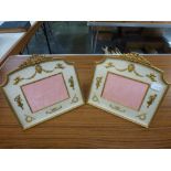A splended pair of Edwardian style photograph frames in gilt metal of shaped rectangular form with