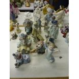 A selection of ten Lladro and Nao porcelain groups of figures which includes clowns, a performing