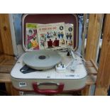 A cased child's Fidelity Record Player and a small number of children's seven inch Nursery Rhyme