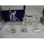 Three Swarovski silver crystal figures with name plates: Pierrot 1999, Columbine 2000, and Harlequin