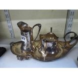 A WMF Art Nouveau set of sugar basin, milk jug and handled tray, in silver-plated pewter, model