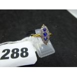 A late Victorian marquise shape sapphire and diamond cluster ring, in 18 ct yellow gold with