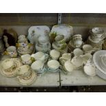 A quantity of table and tea services that includes a Copeland Spode Buttercup cups, saucers and