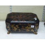 A 19th century Chinese export black lacquer work box, canted rectangular, decorated with figures