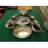 A good late Victorian silver three-piece tea set of heavy gauge with cast pierced borders, black