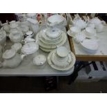 A Wedgwood Opal pattern expansive bone china table service including cups, coffee pot etc.