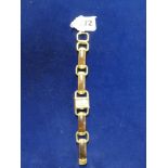 An unusual 1960s lady's Jaeger-Le Coultre 'Etrier' wrist watch, in 18 ct gold, on original segmented