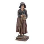WOOD SCULPTURE OF A PEASANT