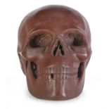 SKULL IN ANCIENT RED MARBLE