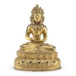 A TIBETAN GILDED BRONZE SCULPTURE DEPICTING AVALOKITESVARA EARLY 20TH CENTURY.