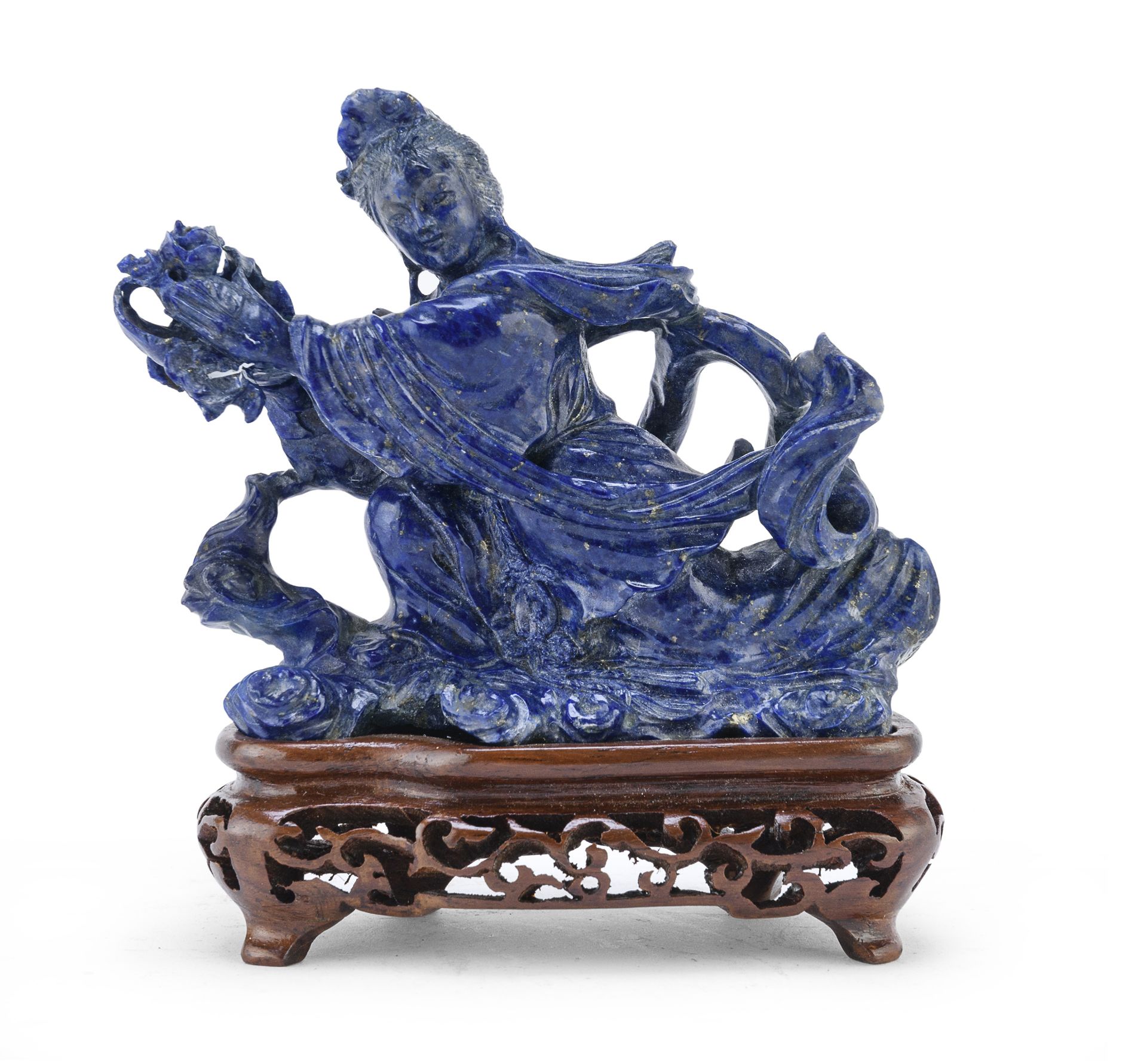 A CHINESE LAPIS LAZULI SCULPTURE DEPICTING HE XIANGU 20TH CENTURY.