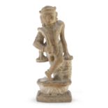 AN INDIAN ALABASTER SCULPTURE DEPICTING KRISHNA 20TH CENTURY.