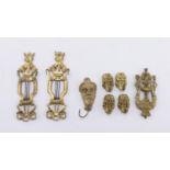 EIGHT BRONZE MIGNON DRESSES HOLDER 19th CENTURY