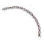 WHITE GOLD BRACELET WITH RUBIES AND DIAMONDS