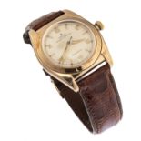 GOLD ROLEX OYSTER PERPETUAL OVETTO BUBBLEBACK WRISTWATCH REF. 2940