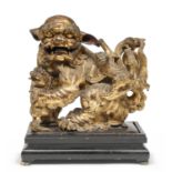 A RARE LACQUER AND GILT ON WOOD GROUP DEPICTINMG THREE SHISHI CHINA EARLY 20TH CENTURY