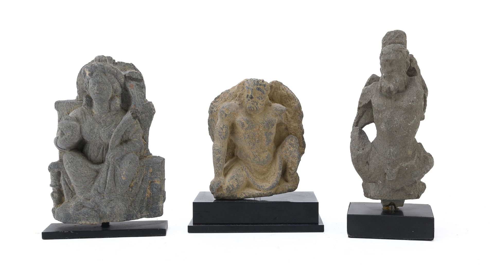 THREE SCHIST FIGURES DEPICTING ATLAS AND HARITI ART OF GANDHARA 2ND-3RD CENTURY A.C.