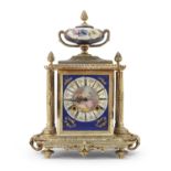 TABLE CLOCK IN METAL AND PORCELAIN EARLY 20TH CENTURY