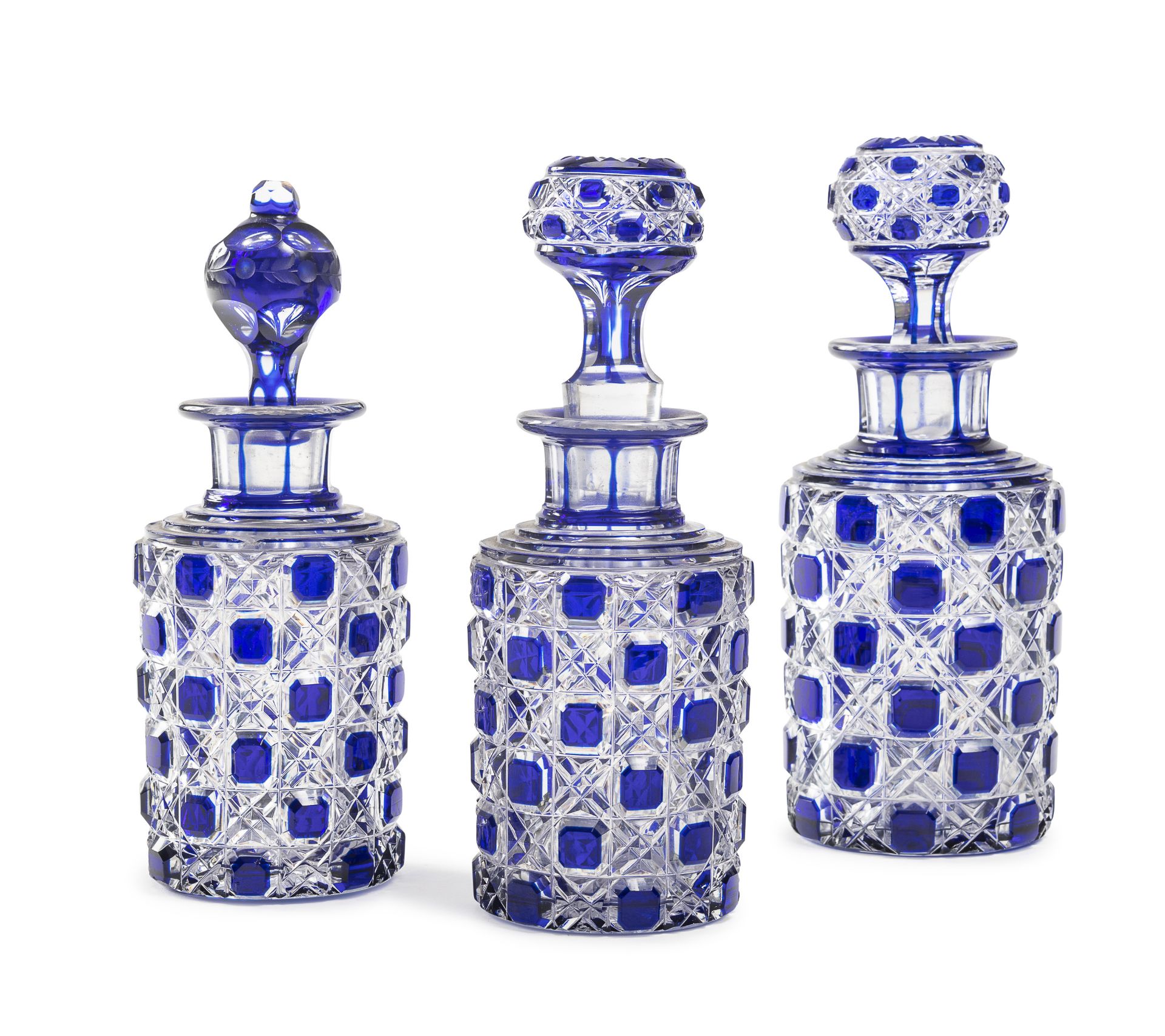 THREE CUT CRYSTAL BOTTLES EARLY 20TH CENTURY