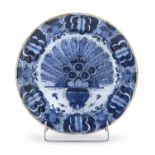 LARGE CERAMIC PLATE WITH WHITE AND BLUE DECORATION DELFT SECOND HALF 18TH CENTURY