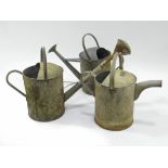 GALVANISED WATERING CANS.
