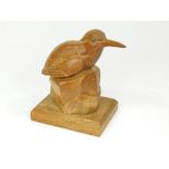 FAUST LANG. A wood carving of a Kingfisher. Carved signature, 'Faust Lang'. Max. width 16cm.