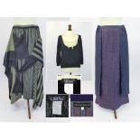 ISSEY MIYAKE ETC. An Issey Miyake woollen skirt with knotted front. Size M.