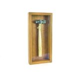 JOHN BEUSMANS. A John Beusmans, Carn Pottery ceramic hammer in glazed, oak case. Height 35cm.