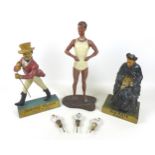 A group of three advertising mascot figures, comprising a 1950s table top advertising model for mens