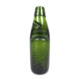 A Dawson of Norwich Codd bottle, dark green glass with marble still intact, heavily embossed 'DAWSON